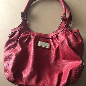 Red handbag.